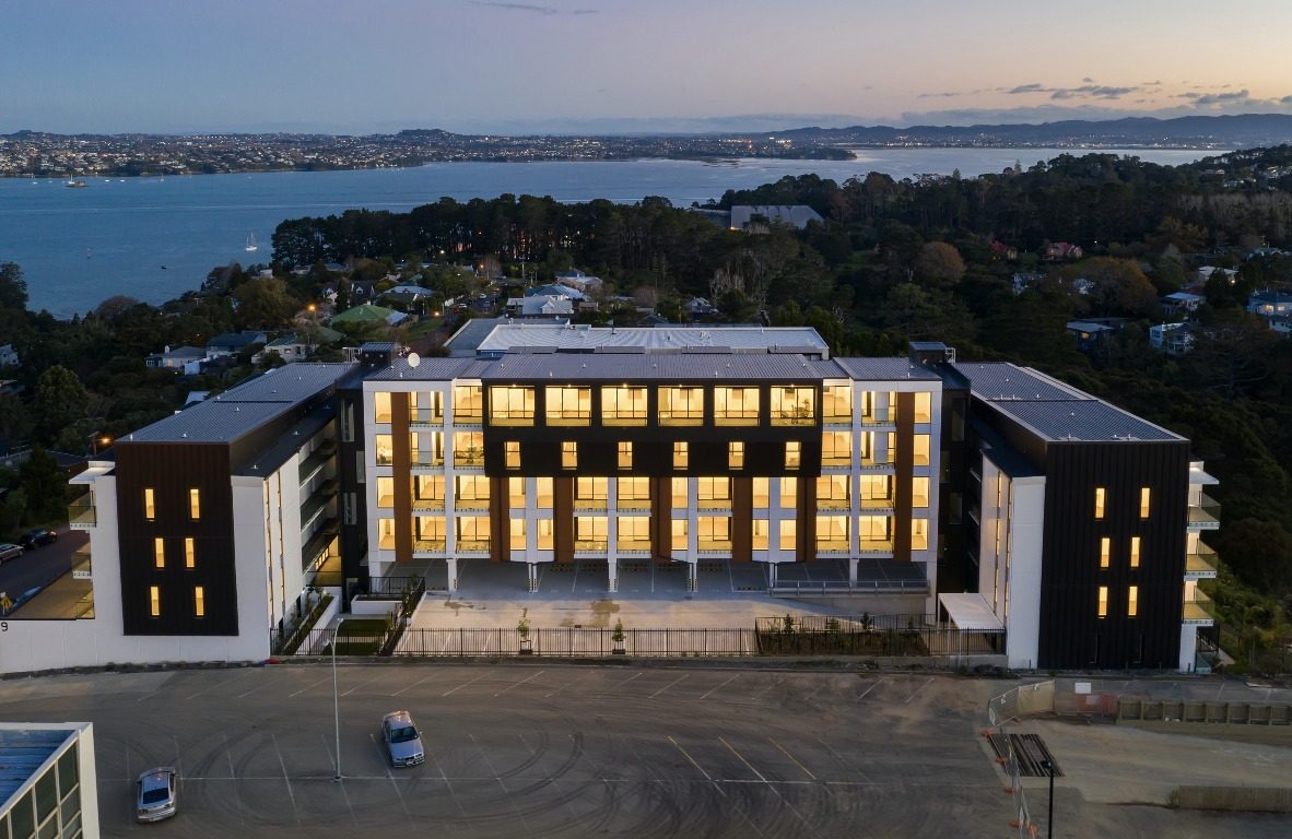 Arial view of apartment with glowing yellow windows